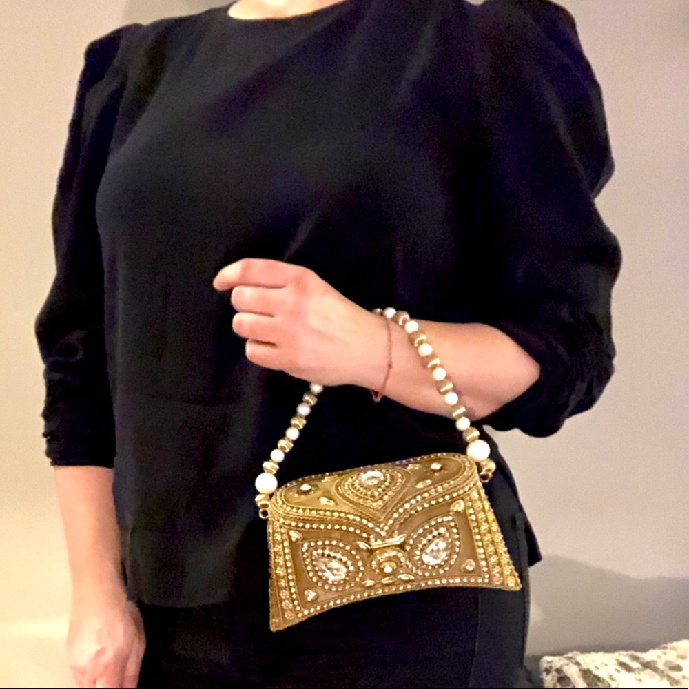 Gold and rhinestone metal purse